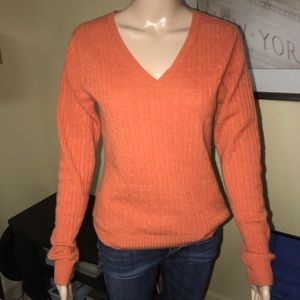 Orange cable knit sweater